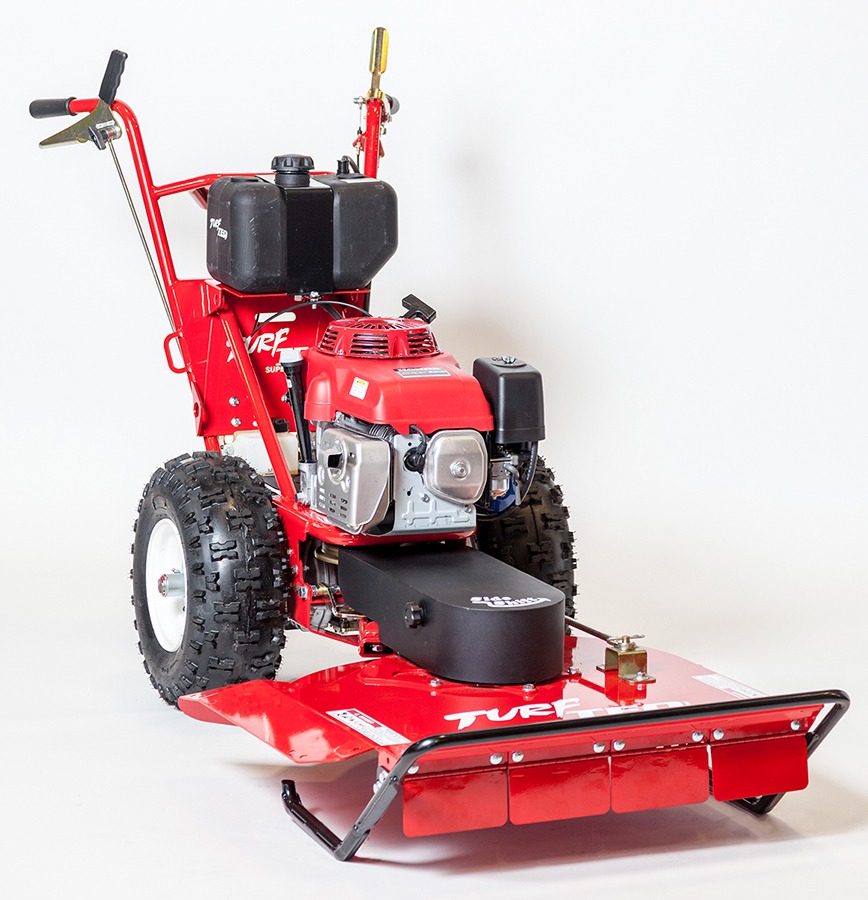 Side view of a field and brush mower